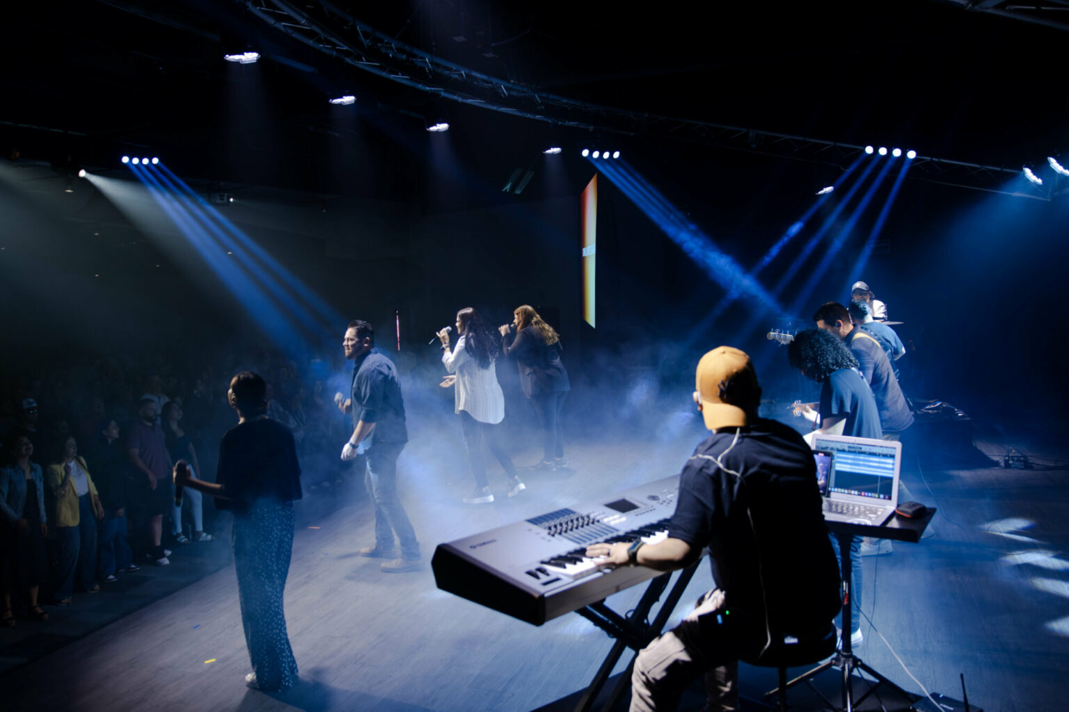 Lit stage during the Sunday gathering