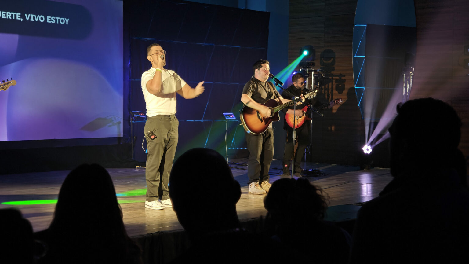 Two people on stage during the gathering