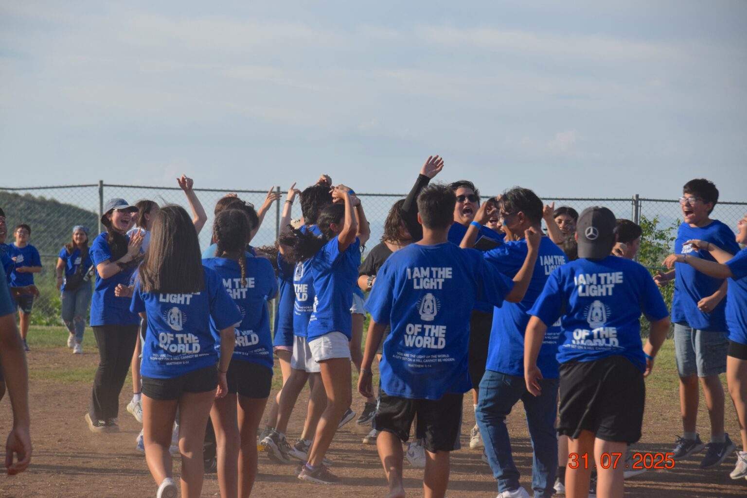 Students running together during a game