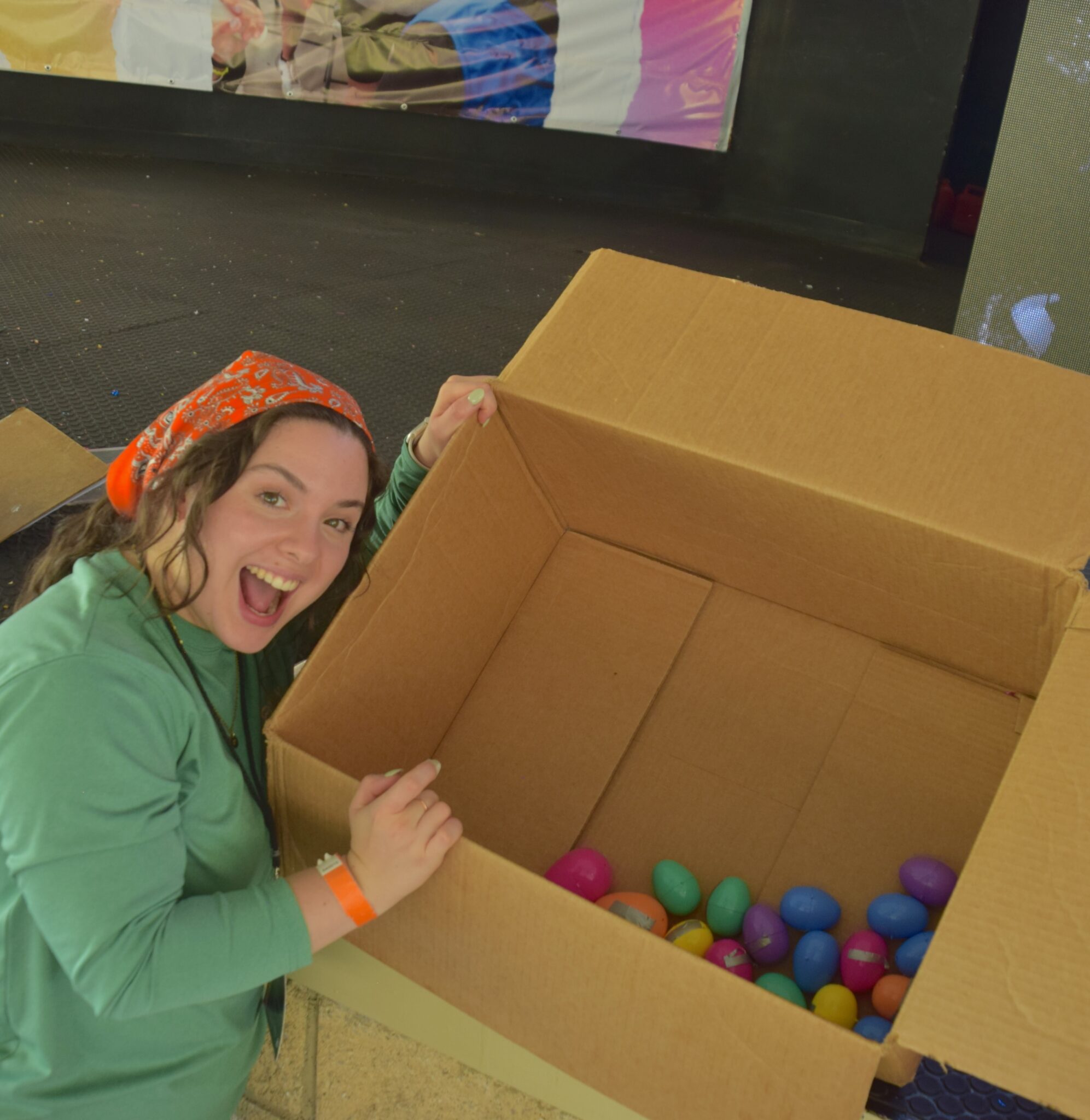 A volunteer setting up the materials for a game
